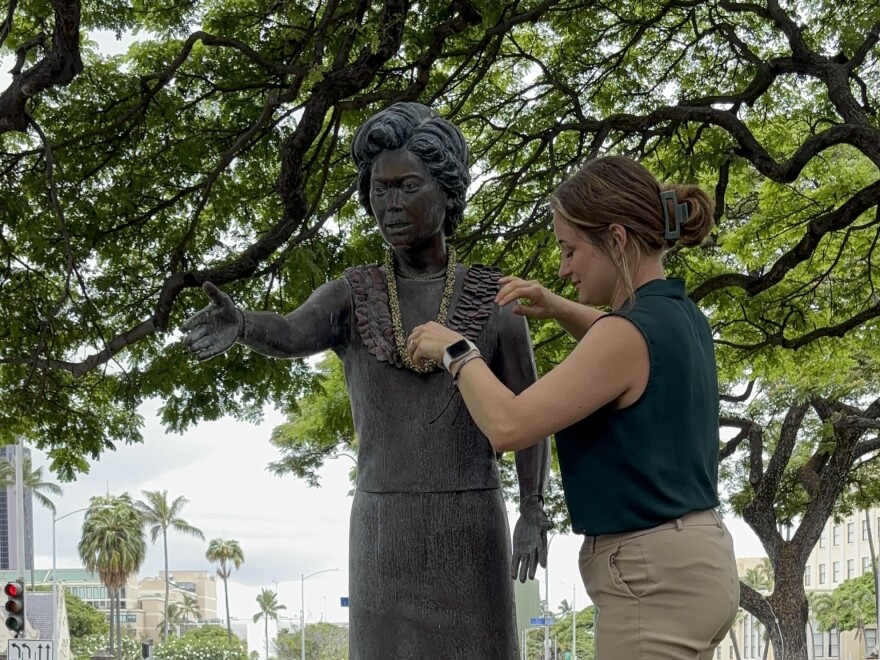 A lei draping is held at the Patsy T. Mink statue at the Hawaiʻi State Library to mark the 54th anniversary of the signing of Title IX. (June 23, 2026)
