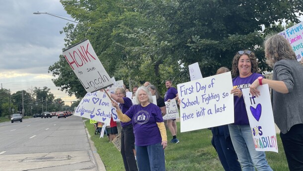Lakewood parents and others protest outside the Lakewood Board of Education Offices at the Taft Center for Innovation on Monday, Sept. 24.