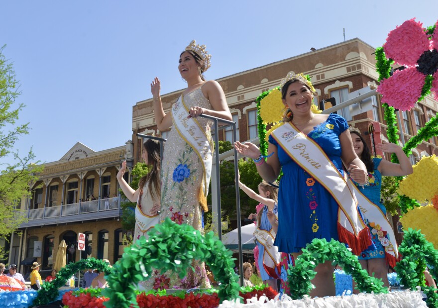 Fiesta princesses smile and wave from their floats in 2022.
