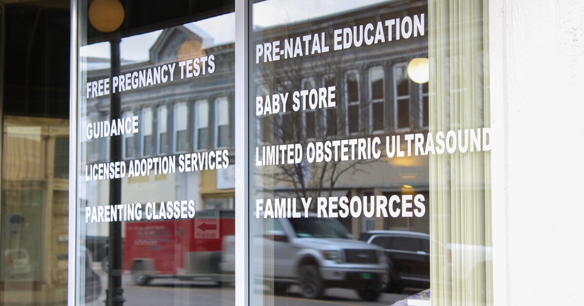 Kansas Gov. Kelly blocked a bill protecting anti-abortion centers. Lawmakers overrode her veto