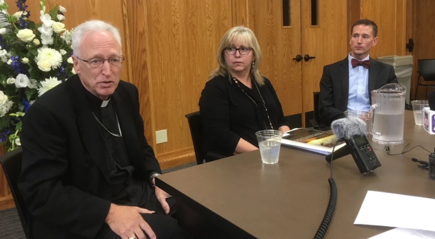 (L to R): Bishop Earl Boyea; assault survivor and counselor Eileen Craig; and Diocese of Lansing General Counsel Will Bloomfield.