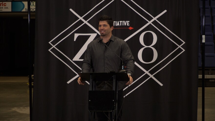 LifeLight CEO Josh Brewer announces a new concert as part of the ministry's Z8 youth initiative at the Sioux Falls Arena on November 4, 2021.