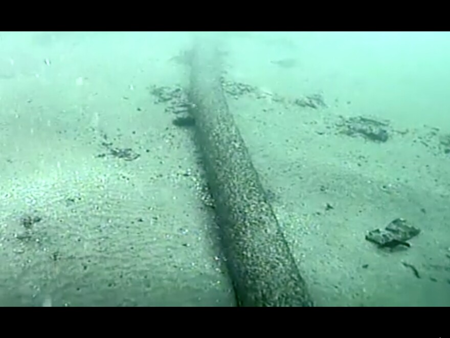 This still image from video taken Monday, Oct. 4, 2021, and provided by the U.S. Coast Guard shows an underwater pipeline that spilled tens of thousands of gallons of oil off the coast of Orange County, Calif. Video of the ruptured pipeline shows a thin crack along the top of the pipe that could indicate a slow leak that initially was difficult to detect, experts said.