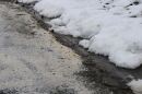 Salt seen on a roadway during snowy weather in the Chesapeake Bay region.