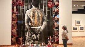 Delilah Montoya stands in front of her installation La Guadalupana at the Albuquerque Museum.