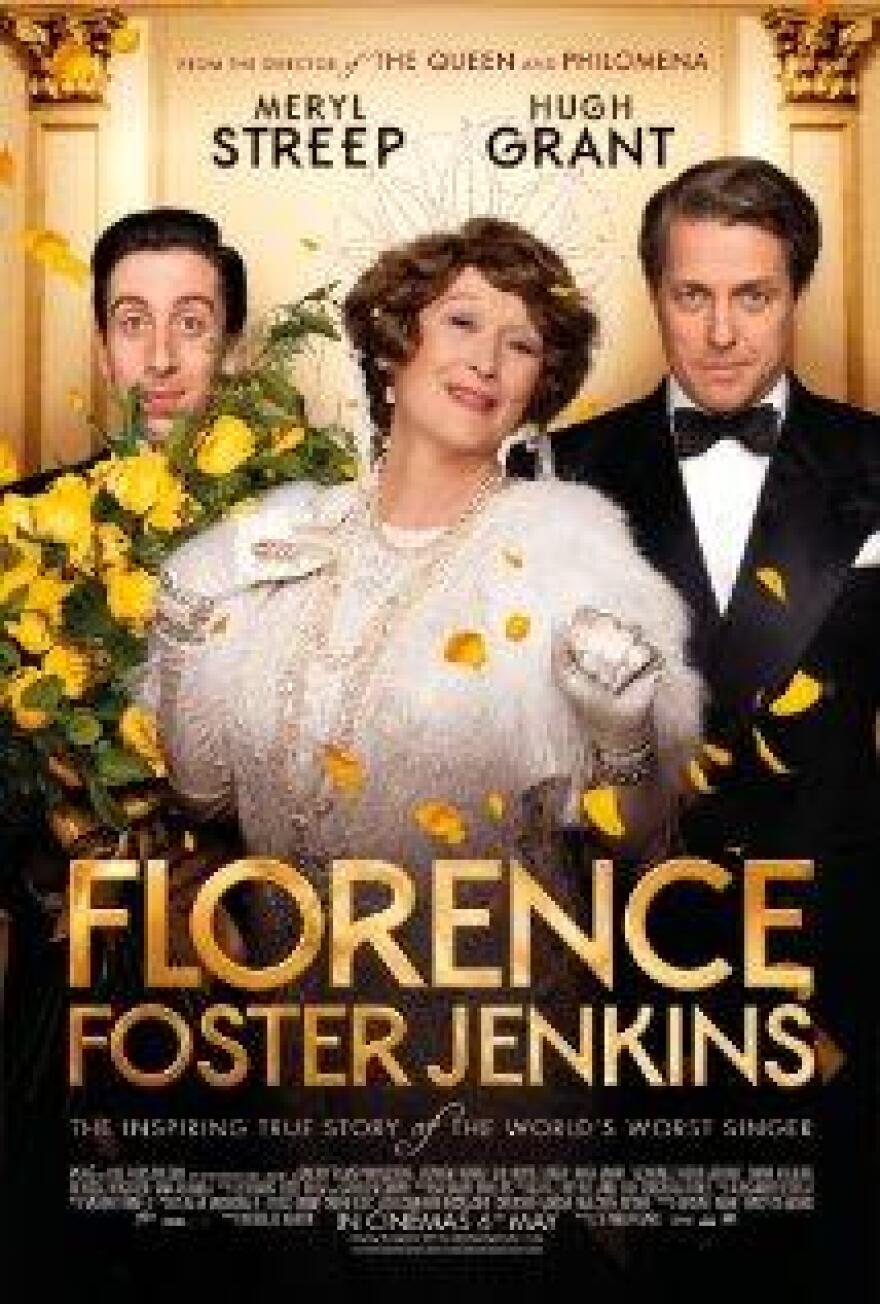 Florence Foster Jenkins movie poster - Meryl Streep in elegant white dress and tiara, Simon Helberg behind flowers on left and Hugh Grant in tux on right
