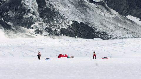 Alex Luebke and Marianne Karplus make their way back to camp during a multi-week field season with the Institute for Glacier Stewardship.