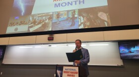 Greene County Presiding Commissioner Bob Dixon reads a proclamation declaring August 2026 as National Emergency Management Awareness Month.