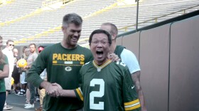 The members of the Japanese Packers Cheering Team had some heartwarming interactions with former Green Bay Packers, including Mason Crosby, pictured here.