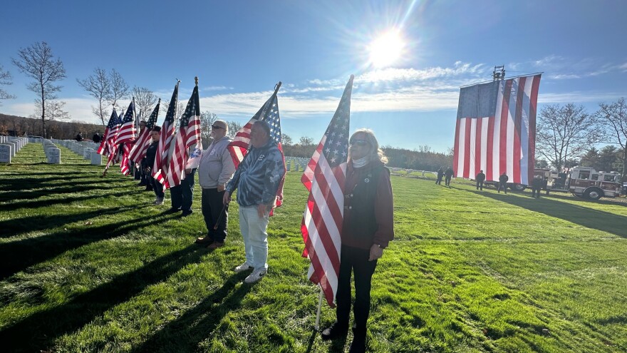 Members of the Connecticut Patriot Guard Riders stand as flag bearers at the veterans' burial ceremony.