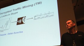 A PowerPoint slide is projected on a screen prior to a lecture at the 28th Chaos Communication Congress computer hacker conference in Berlin.