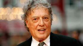 In this Sept. 4, 2012 file photo, British playwright Tom Stoppard poses as he arrives for the world premiere of "Anna Karenina," in London.  (Sang Tan, File/AP)