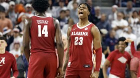 Alabama forward Nick Pringle (23) reacts after they beat Auburn in an NCAA college basketball game, Saturday, Feb. 11, 2023, in Auburn, Ala. (AP Photo/Butch Dill)