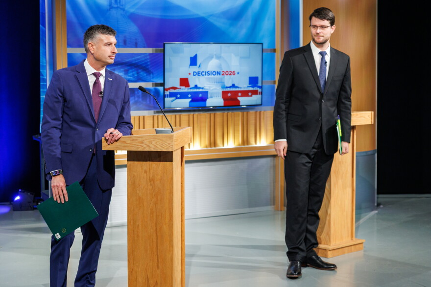 U.S. Rep. Tom Barrett, R-Charlotte, left, and Democratic nominee for U.S. House William Lawrence, right, after the conclusion of their first head-to-head debate at WKAR's studios in East Lansing, Mich., on Oct. 6, 2026.