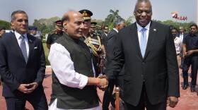 Indian Defense Minister Rajnath Singh, second left, welcomes U.S. Secretary of Defense, Lloyd Austin before their meeting, in New Delhi, India, Monday, June 5, 2023.