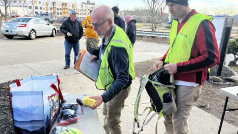 Volunteers gather supplies before heading out for the Point-In-Time count in January 2024.