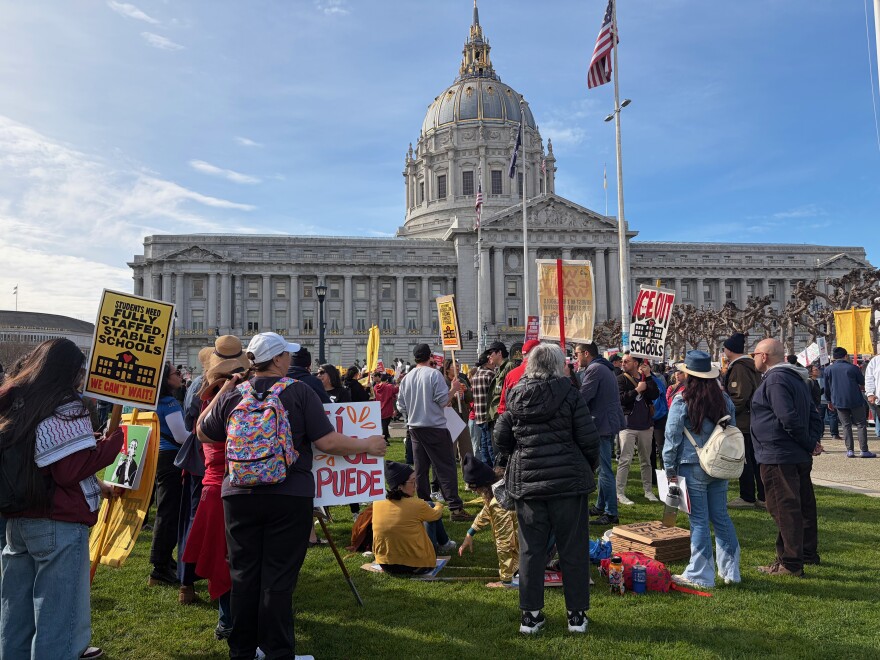 Thousands of educators and community members rally at Civic Center Plaza on Feb. 9, 2026.