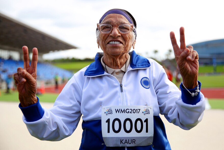 Man Kaur of India celebrates after competing in the 100-meter sprint in the 100+ age category at the World Masters Games in Auckland, New Zealand, in April.