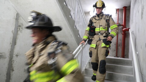 Firefighters take part in the annual Navarre Beach Stair Climb on Friday morning.