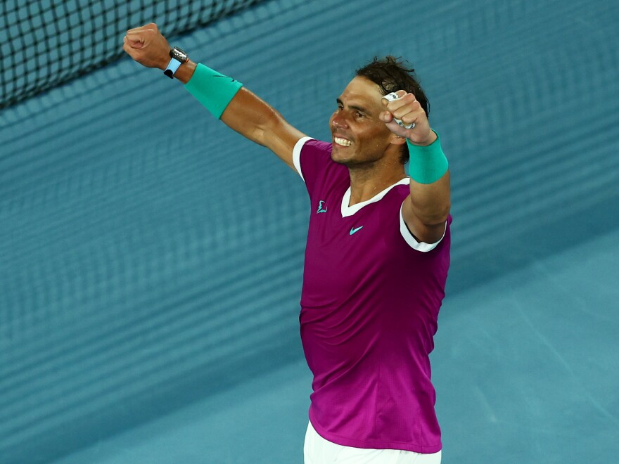 MELBOURNE, AUSTRALIA - JANUARY 28: Rafael Nadal of Spain reacts after winning his Men's Singles semifinal match against Matteo Berrettini of Italy during day twelve of the 2022 Australian Open at Melbourne Park on January 28, 2022 in Melbourne, Australia. (Photo by Clive Brunskill/Getty Images)
