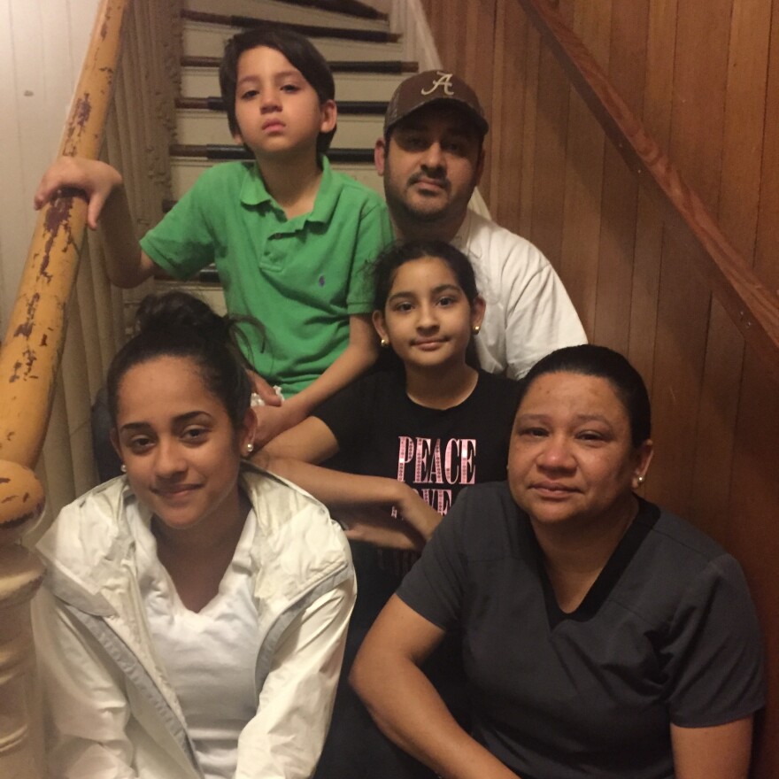 Irma Martinez-Delarca and her husband Walter Martinez, pictured with their three children, fear they are priorities for deportation under President Trump's immigration policy.