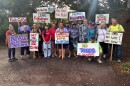 About 20 Moloka'i residents gathered last Thursday at the Kalaupapa trailhead to oppose the inaugural National Park Service hiking tour to Kalaupapa.