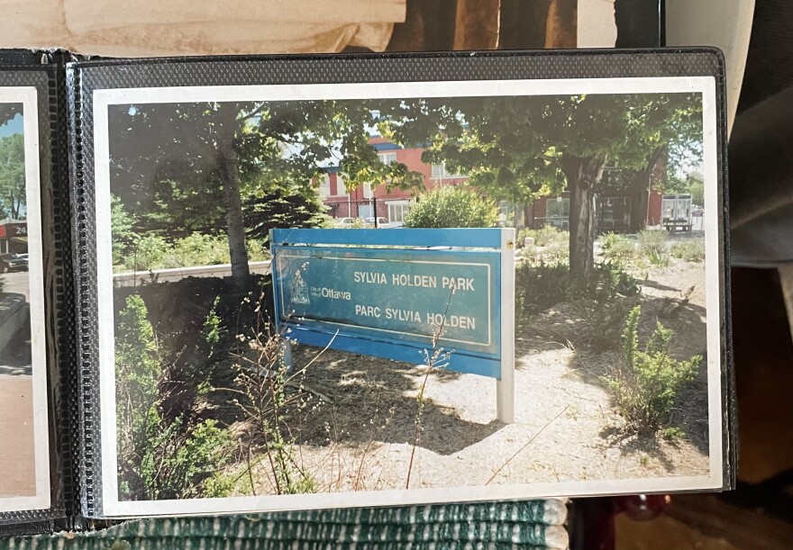 A picture of a photo of a sign that reads, "Sylvia Holden Park"
