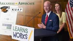 From left: Arkansas Education Secretary Jacob Oliva and Gov. Sarah Huckabee Sanders tout the improvements in public school students’ test scores at a press conference at the Arkansas Capitol on June 18, 2026.
