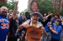 Fans cheer before the New York Knicks' NBA championship parade Thursday, June 18, 2026, in New York. (Ryan Murphy/AP)