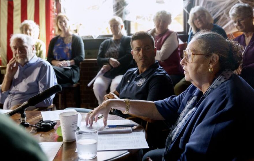 Unaffiliated candidate for governor Betsy Johnson talks with bar and restaurant owners about issues they have faced in downtown Portland, Oct. 17, 2022.
