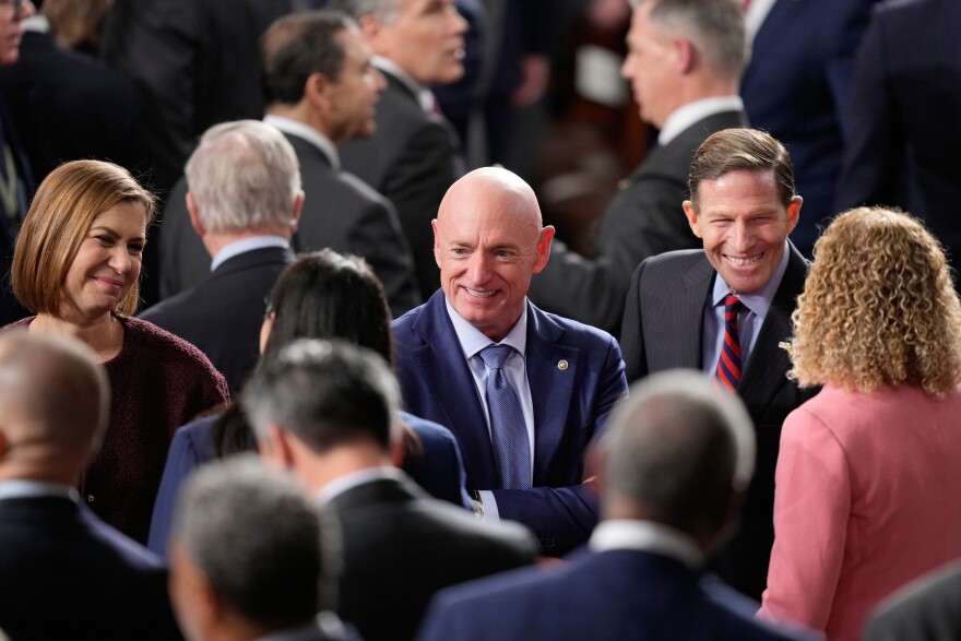 Sen. Elissa Slotkin, D-Mich., left, Sen. Mark Kelly, D-Ariz., center, and Sen. Richard Blumenthal, D-Conn., right, are seen before President Donald Trump delivers the State of the Union address to a joint session of Congress in the House chamber at the U.S. Capitol in Washington, Tuesday, Feb. 24, 2026. (AP Photo/Alex Brandon)