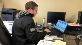 Rodney Davis working at desk