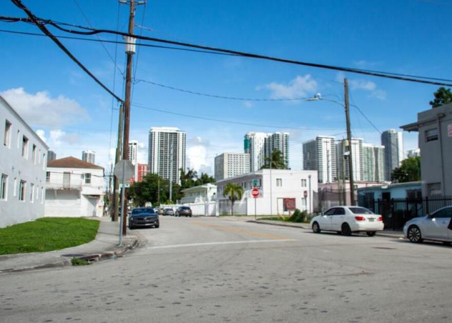View of Overtown's small-scale houses to the high-rises in Downtown Miami.
