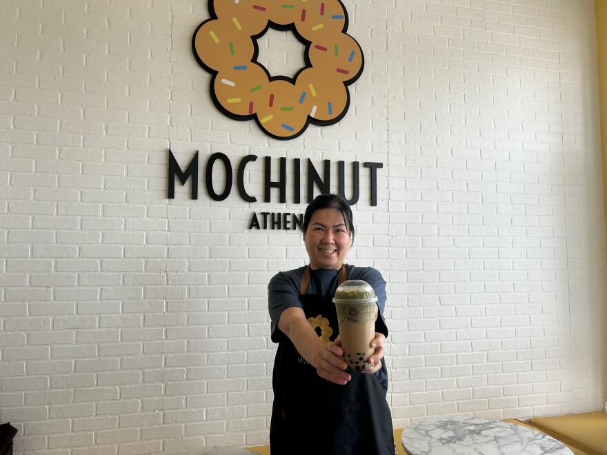 Vienna Lie serving up boba in her restaurant Mochinut on the Eastside of Athens.