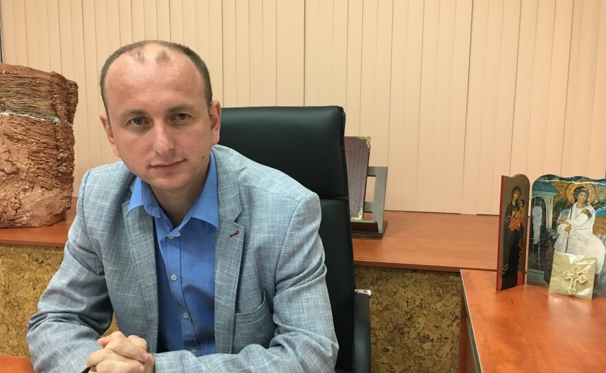 Milan Knezevic, a lawmaker with the Democratic Front, the anti-NATO party which is Montenegro's main opposition, has been implicated in the coup investigation. He denies any involvement and says the governing party fabricated the coup allegations to cover up its corruption and to jail its political opponents.
