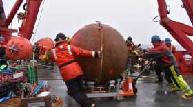 Researchers recover an old mooring from Ocean Station Papa during an Ocean Observatories Initiative expedition.