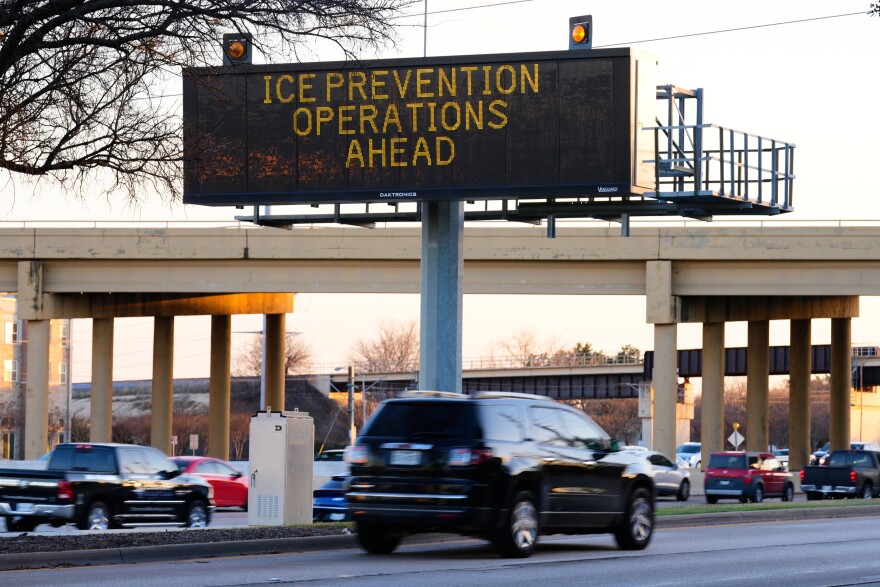 A digital billboard along Highway 75 warns of road preparations for upcoming inclement weather expected in the region Wednesday, Jan. 21, 2026, in Richardson, Texas.