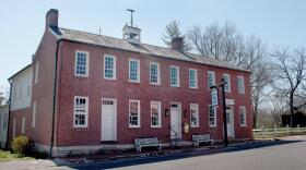  J. Huston Tavern sits on the main street in Arrow Rock. It is a key attraction at the Arrow Rock State Historic Site and is included on the National Register of Historic Places.