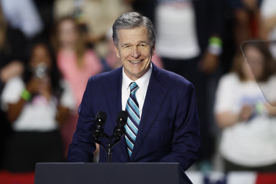 FILE - North Carolina Gov. Roy Cooper speaks at a campaign event in Charlotte, N.C., Sept. 12, 2024.