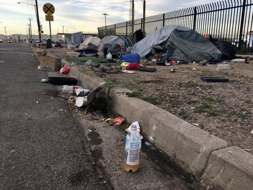 trash outside tents
