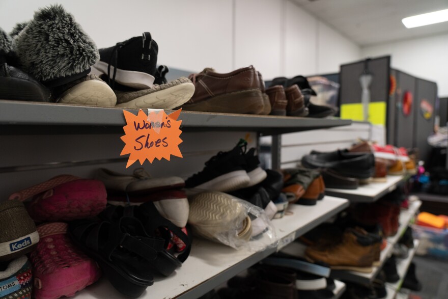 Casa Alitas set up a fake store for people to come and grab clothing items like shirts, pants, underwear, and shoes.