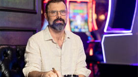 Isaac Reed smokes a cigar in a local Vegas casino.