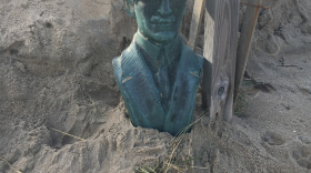 National Park Service officials say a copper reproduction bust of Wright Brother Orville Wright was spotted in some beach dunes.
