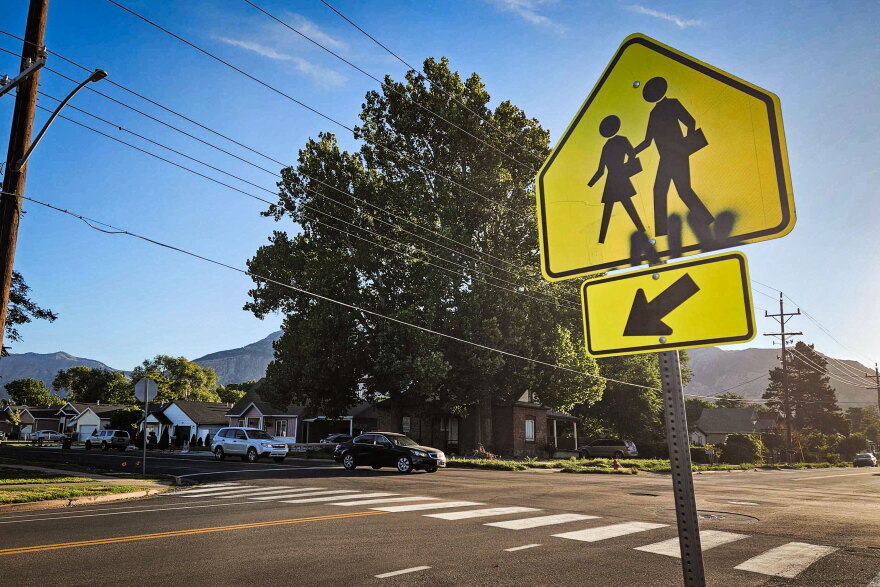 A zebra crosswalk with a school crossing sign near a school in Ogden, Sept. 10, 2026.
