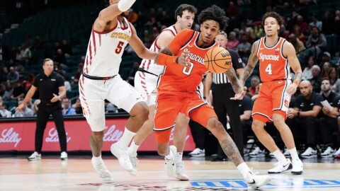 Sadiq White (0, Orange) knifes his way through the lane against Iowa State