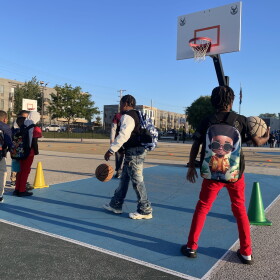 Young students play basketball before school at Browning Elementary School in Milwaukee on Tuesday, Sept. 2, 2025.