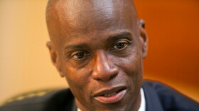 FILE - Haiti's President Jovenel Moise speaks during an interview at his home in Petion-Ville, a suburb of Port-au-Prince, Haiti, on Feb. 7, 2020. (AP Photo/Dieu Nalio Chery, File)