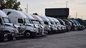 Semitrucks line up at a Kansas City truck stop in a region where nearly 1 in 10 workers hold transportation and material moving jobs.