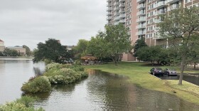 Tidal flooding from the Hague spills into a nearby housing complex in Norfolk in 2021.