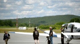 Passengers disembark off a flight from Boston at the Lebanon Municipal Airport on June 16, 2026 in West Lebanon, New Hampshire. (Valley News photo)